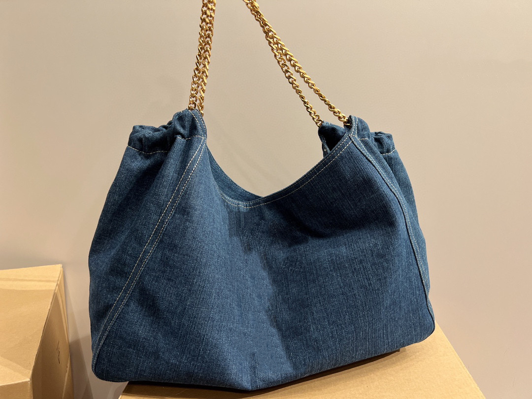 7A Sac à bandoulière en cuir denim à la mode avec logo en lettre à sequins en métal pour sac à provisions de grande capacité pour femme ID de luxe michafl_kops