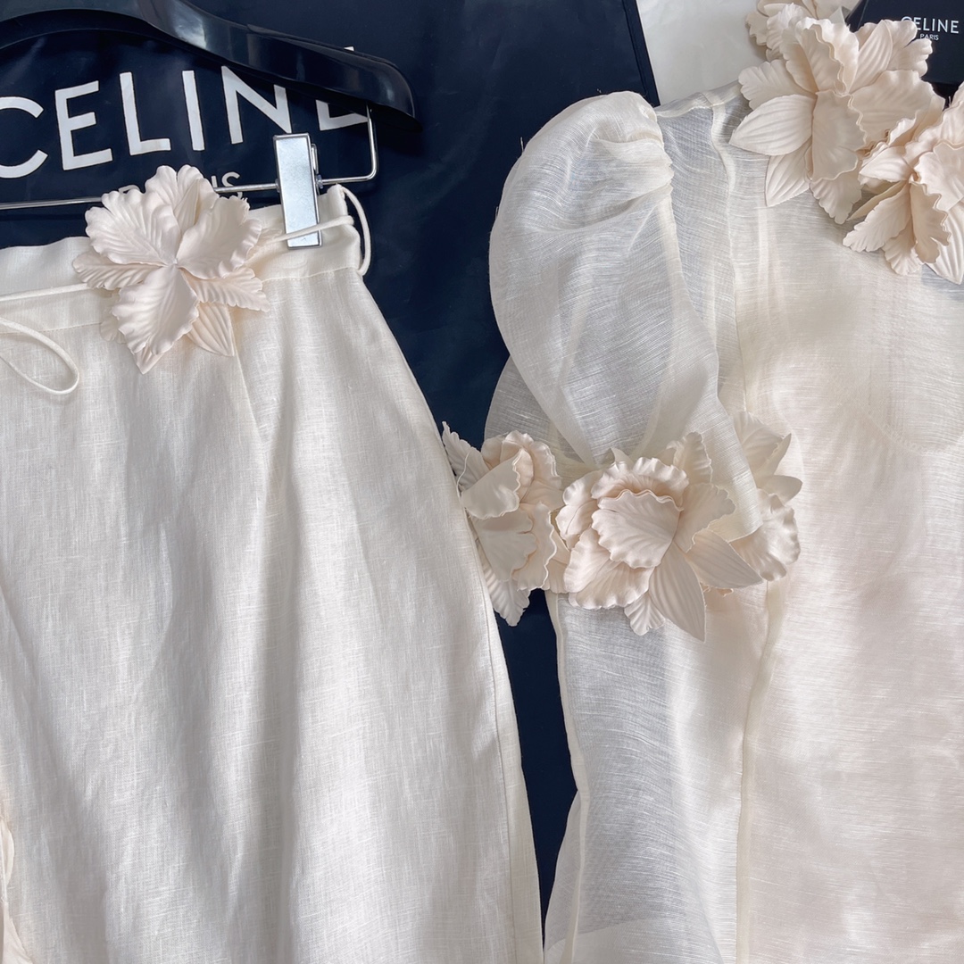Tvådelad klänning australisk designer designer den senaste tredimensionella blommor dekoration linnetopp för våren och sommaren med hög midja och skinkor