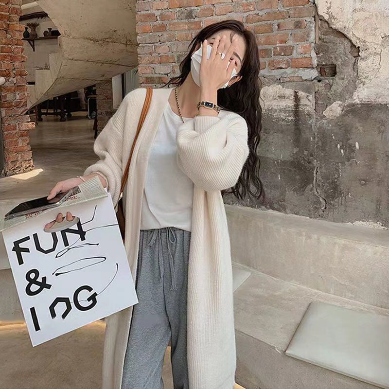 Net Celebrity Burst gestrickte Damen Herbst und Winter neues Design Sinn für kleine hochwertige lange Strickjacke V-Ausschnitt Mantel Pullover Großhandel