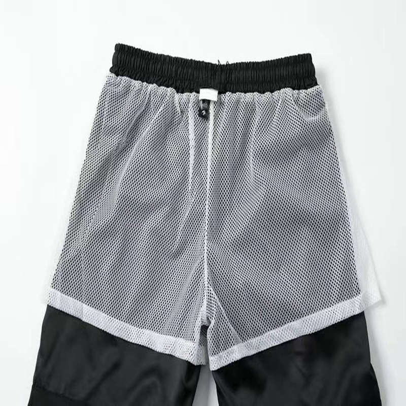 Luxo masculino Designer de calça Man Carta de verão Carta de bolso impresso Casual shorts homens esportes de fitness ao ar livre, pertencente à praia versátil de praia