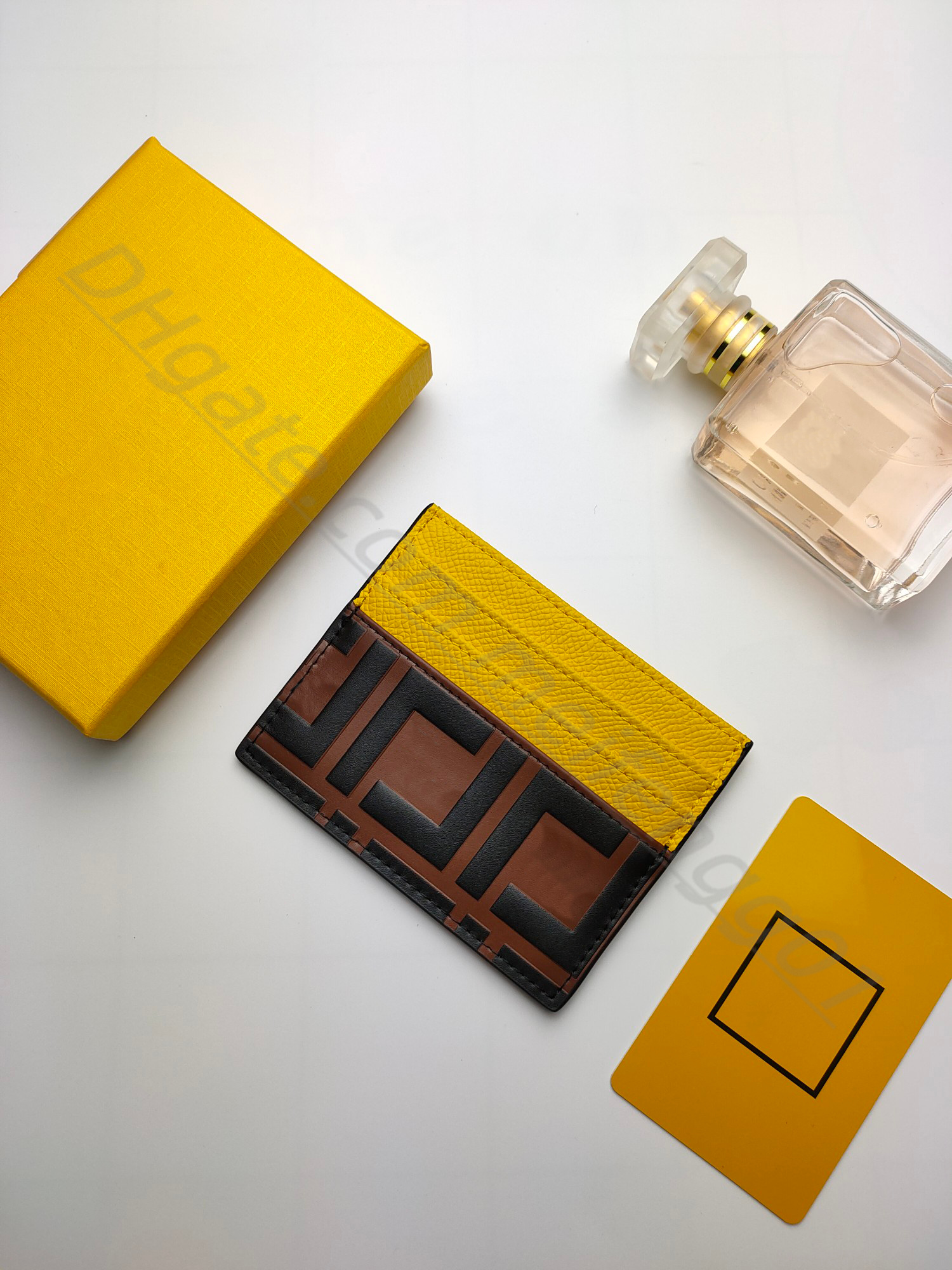 Porte-cartes en cuir véritable de qualité supérieure Luxurys Designers Sac à main de mode Hommes Femmes Porte-cartes COIN Mini portefeuilles Porte-clés Boîte d'origine