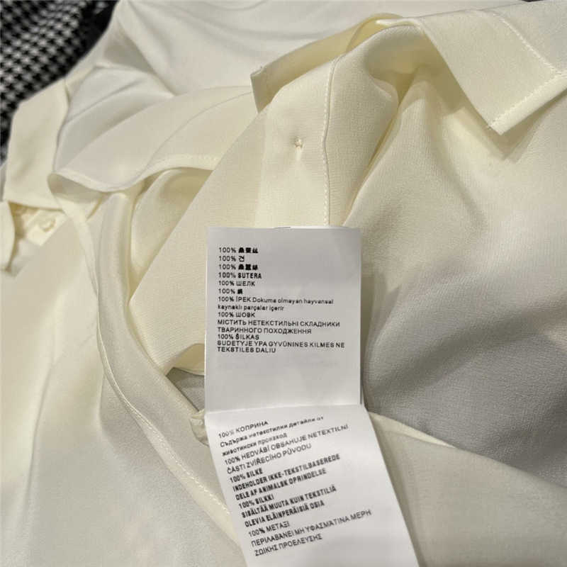 Women's Blouses Shirts Designer Nieuwe comfortabele een enkele borst met een enkele borsten Polo kraag klein vers temperament woon -werkverkeer vaste kleur driehoekspatroon zijde voering 5dm0