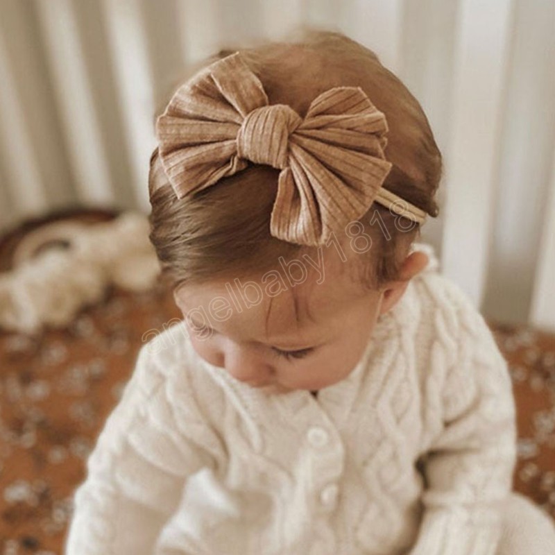 女の赤ちゃんの弾性弓のヘッドバンドハンドメイドヘアボウノットナイロンヘアバンド新生児幼児スクローヘアアクセサリー