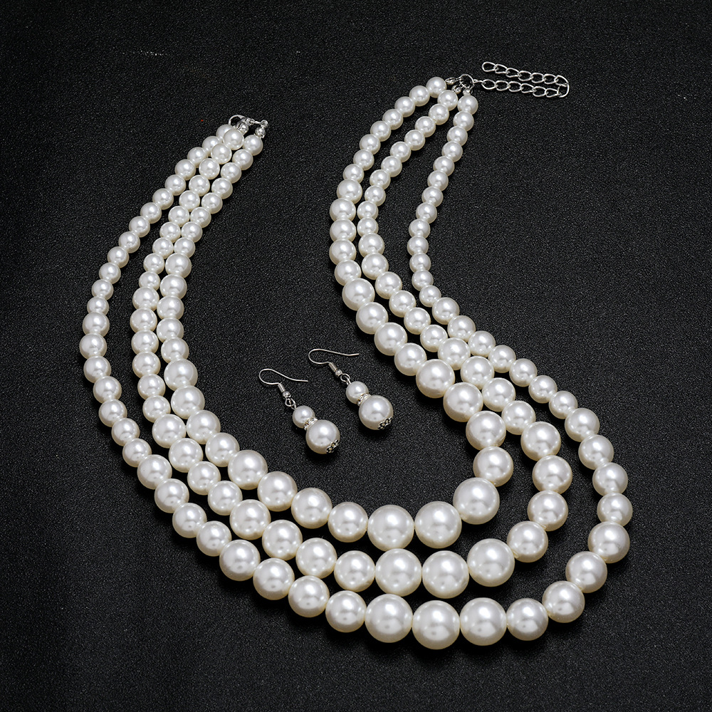 Multi -lager White Simulated Pearl Necklace örhängen smycken set för kvinnor brud överdrivna fest halsband örhängen set smyckespresentationspris pris