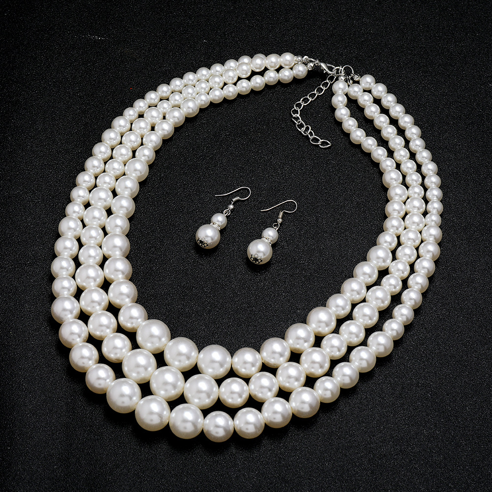 Multi -lager White Simulated Pearl Necklace örhängen smycken set för kvinnor brud överdrivna fest halsband örhängen set smyckespresentationspris pris