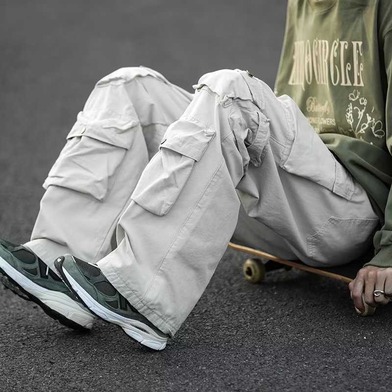 Pantalons pour hommes Street rétro décontracté grandes poches couvrent le nouvel été taille haute ample coupe droite pantalon à jambes larges pour hommes et femmes P230529