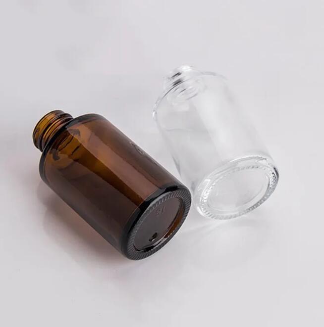 Flacone di vetro da 30 ml a spalla piatta smerigliato/trasparente/ambrato rotondo flacone contagocce di siero di olio essenziale flaconi cosmetici vuoti portatili