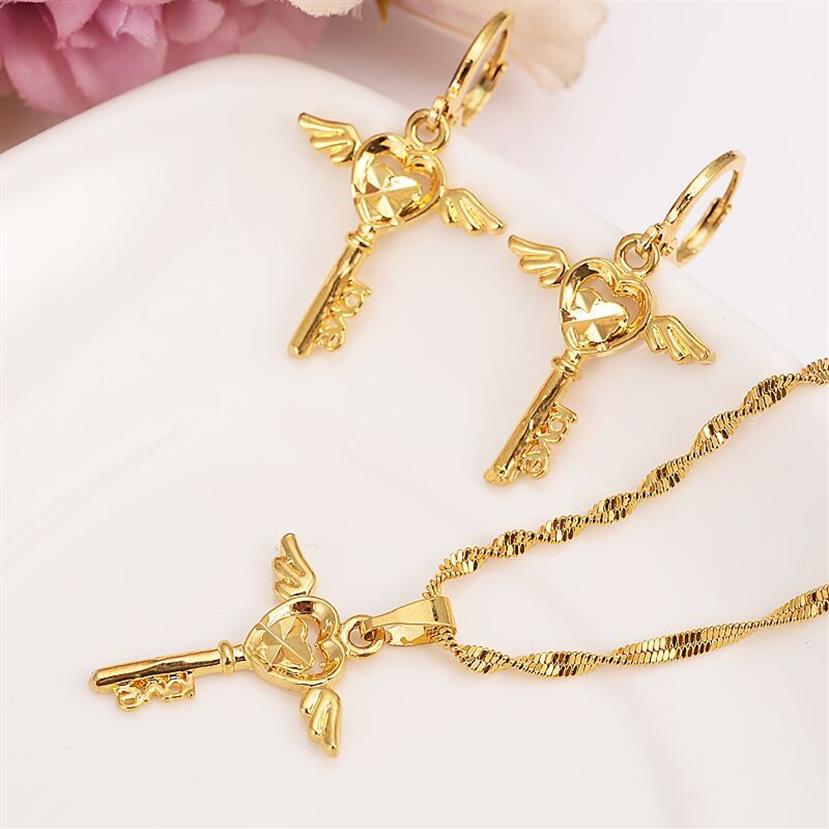 Set di orecchini di collana di moda Set regalo feste da donna Solido oro fine GF modello chiave ala Collana Orecchini Set di gioielli girls306v