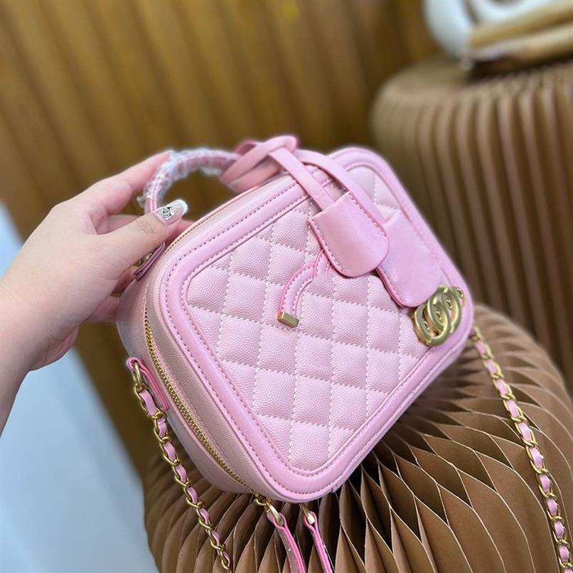 Розовая дизайнерская косметическая сумка женщин мини -цепная сумка сумки для плеч.