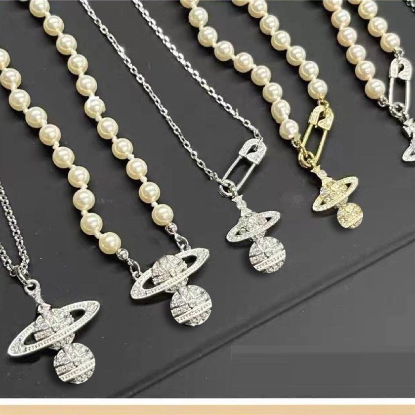 Pinzirkon-Anhänger Saturn-Halskette für Damen Gold Herrenkette exquisite luxuriöse Planet Pin-Halskette Modische Diamanteinlage 9252445