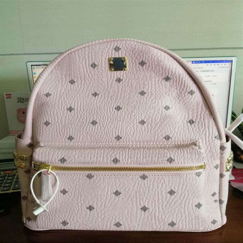 Top quality classic fashion Korean version punk rivet School Bags travel male and female student backpack232u