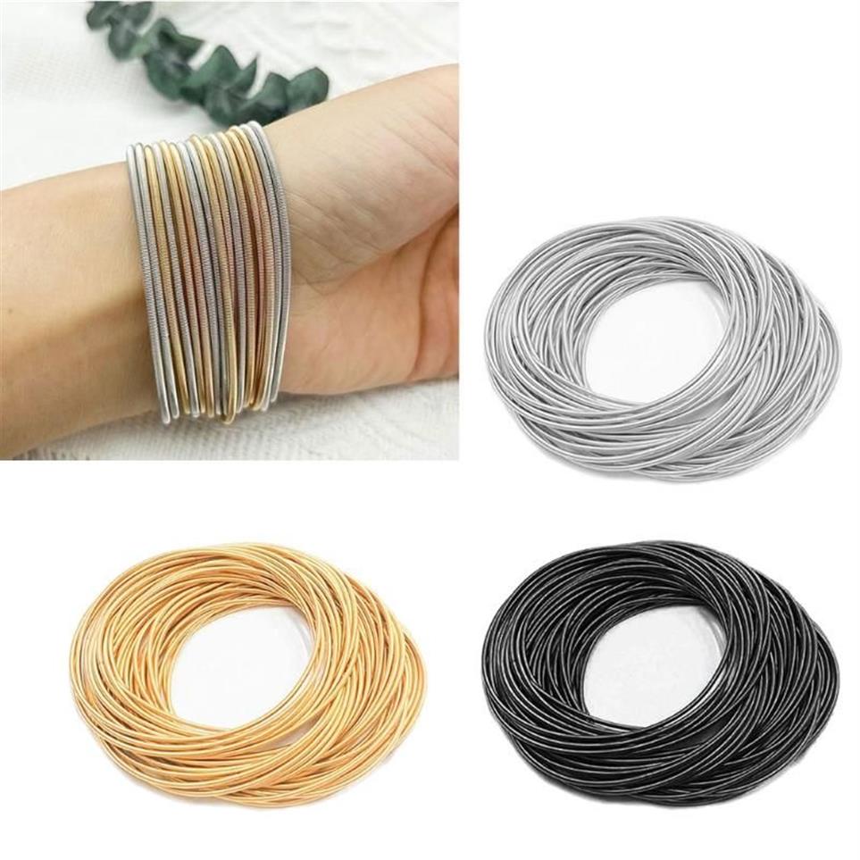 Charm armband 50 st pärlor med guldtäckt fjäderarmband diy spiral kol stål elastisk icke-halk craft254y
