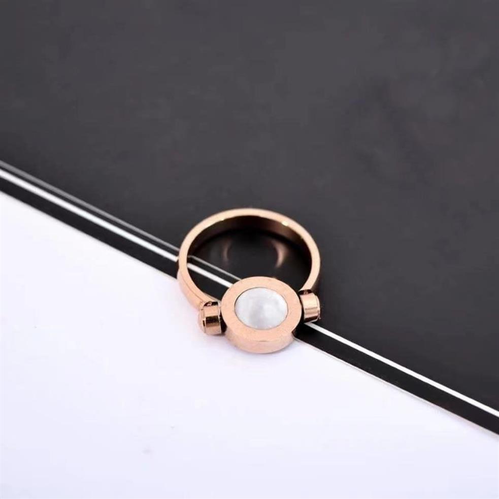 Hoogwaardige roségouden dubbelzijdige rotatie met zijstenen ringen Mode dame creatieve flip-ring Stuur originele geschenkdoos243v