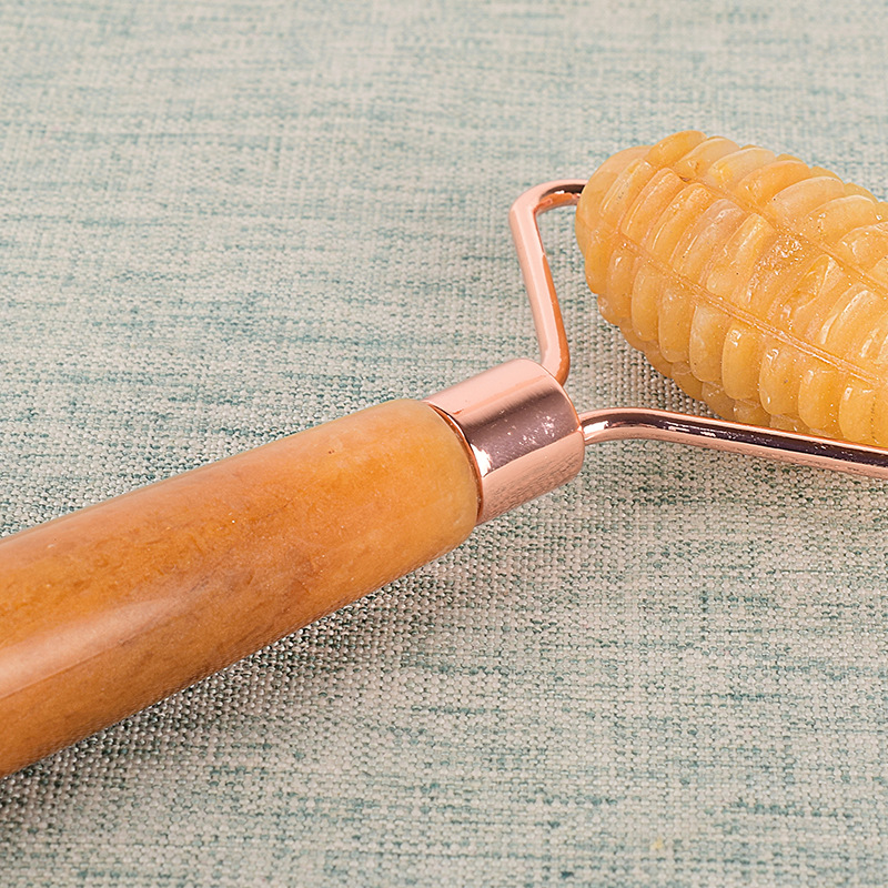 Massaggiatore a rulli di giada gialla Terapia di automassaggio Cura del viso Strumento di bellezza Rullo il viso appuntito con pietra di topazio naturale Cura della pelle antietà