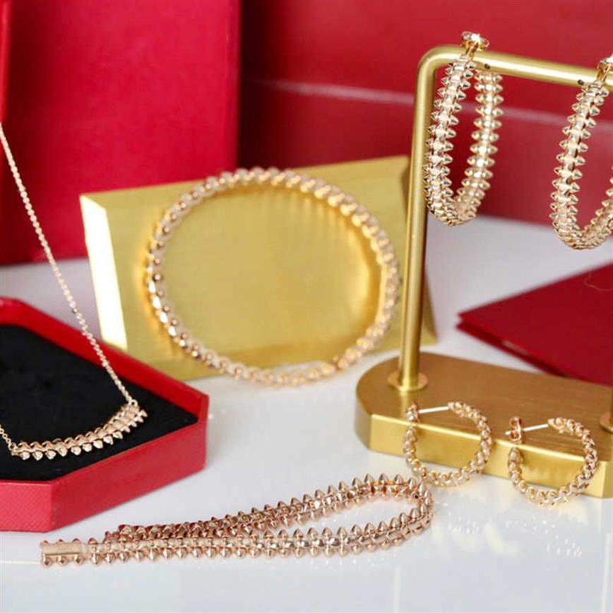 مجموعة مجوهرات أزياء العلامة التجارية للنساء مطلي بالذهب Rive Steam Punk Party Fashion Design Design Drets Netlace Bracelet Ring270L