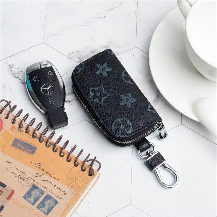 Designer Men Universal Car Key Sacs Case Unisexe Mâle de cuir authentique Veurs de clés de la touche Zipper Zipper Smart Keychain Cas CARS CIRS2349