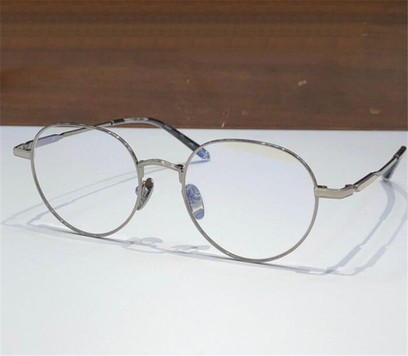 Neue Modedesign runde Form optische Brille SQRTON exquisiter Metallrahmen Retro einfacher und großzügiger Stil mit Box für verschreibungspflichtige Gläser