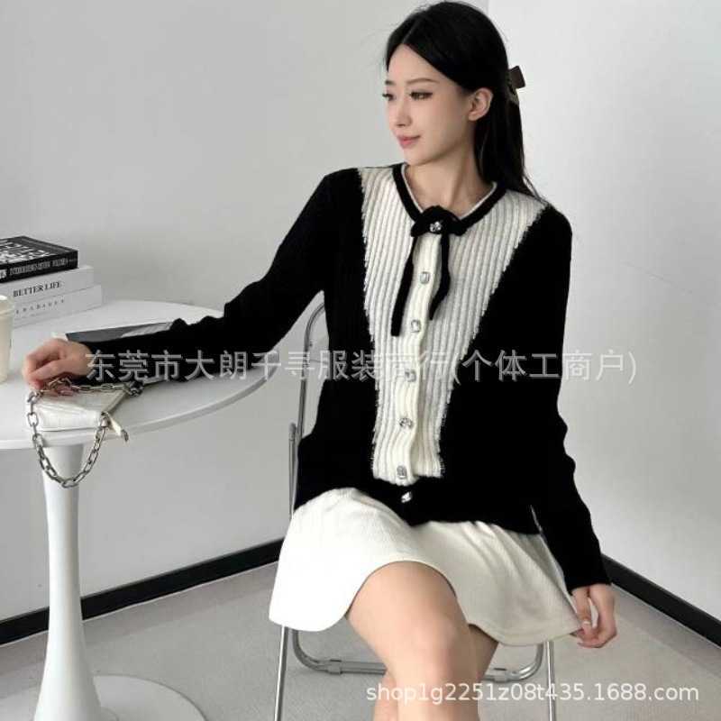 Pulls pour femmes Designer 2023 Automne / Hiver Nouvelle laine française tricotée à col rond avec nœud pour femme 3AS7