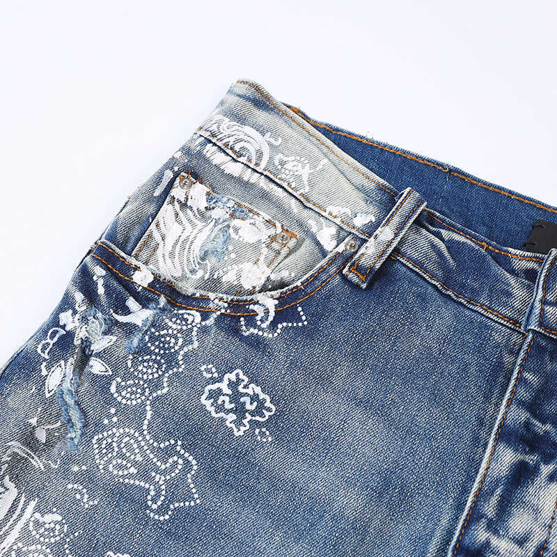 Designer amirssTide Brand Wash Water Light Blue Cashew Flower Knife Cut Hole Slim Fit Skinny Jeans für Männer und Frauen