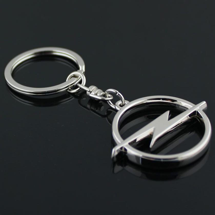الكثير من الموضة المعدنية 3D شعار السيارة سلسلة المفاتيح سلسلة المفتاح حلقة chaveiro llavero لأوبيل Auto Car Accessories WHOL260G