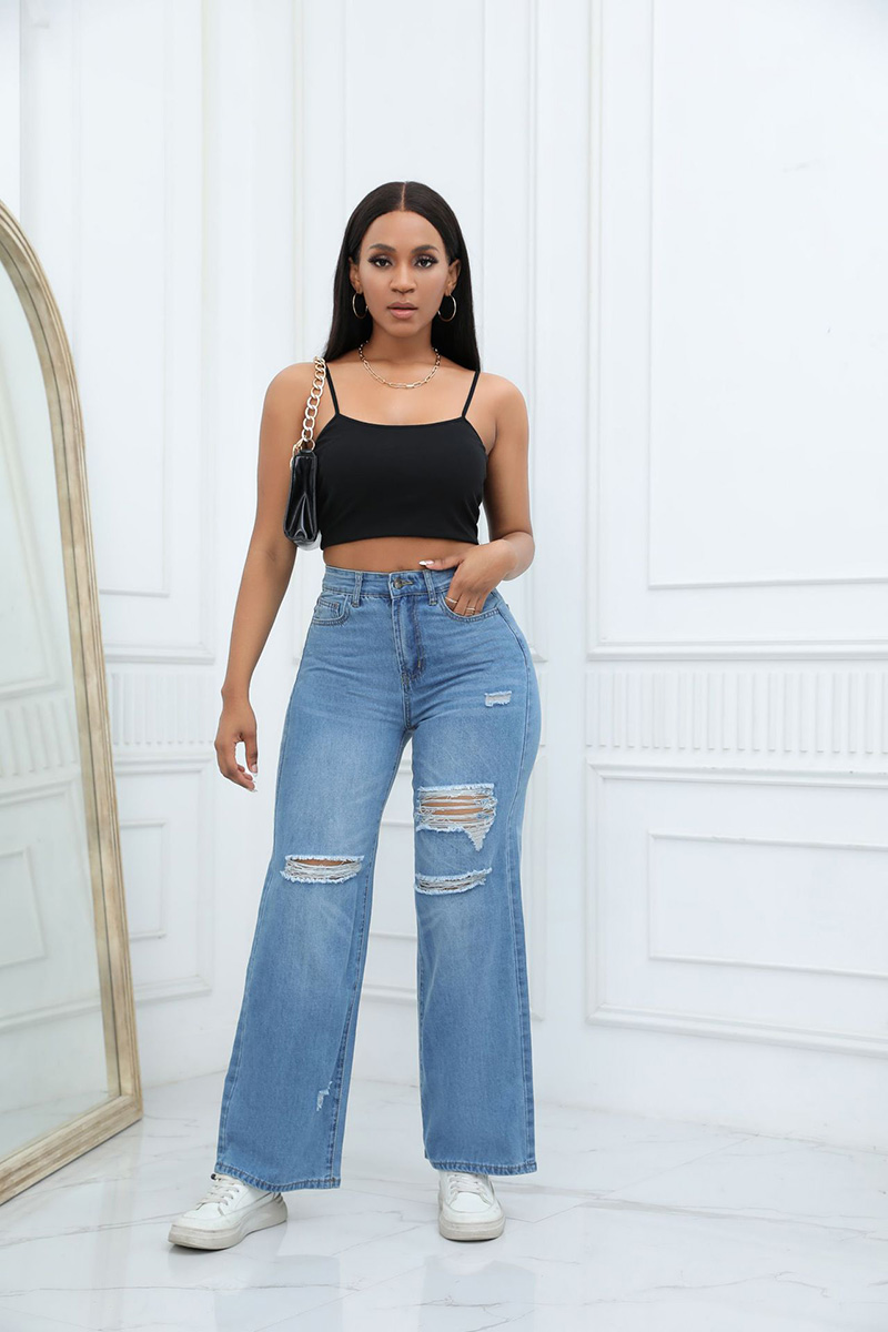 Kvinnor Casual Jeans Flare Pants Knähål Rippade nödläge Vintage Middle midja Fit kvinnliga raka byxor Högkvalitativ gratis frakt