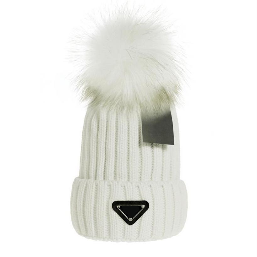 Bonnet chaud d'hiver pour femme, nouvelle mode, grand pompon en fausse fourrure, chapeau à pompon tricoté, casquette de Ski, noir, bleu, blanc, Pink329R