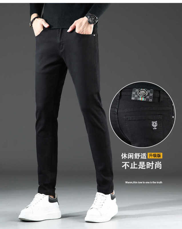 Jeans pour hommes Jeans de marque Printemps Nouveau Guangzhou Xintang Coton Bounce Coréen Petits pieds Slim Fit Haut de gamme Européen Noir et Blanc Lo Fu Tau LQAA