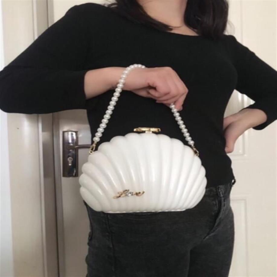 أزياء Women Women Evening Bag Black White Pearl Shell Handbag Lady Christmas Gift Pearls Wristband Facs Clutch Wallet225b