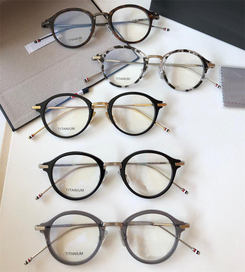 Novo design de moda óculos ópticos redondos 908 armação de acetato de titânio estilo simples e popular óculos de alta qualidade com caixa pode fazer lentes de prescrição