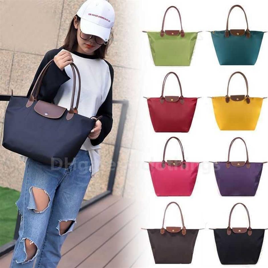 Bolsas Classic Brand Handbag Women Women Genuine Leather Nylon Nylon Gran Almacenamiento Caballo de almacenamiento 70 aniversario Sling Bag304p