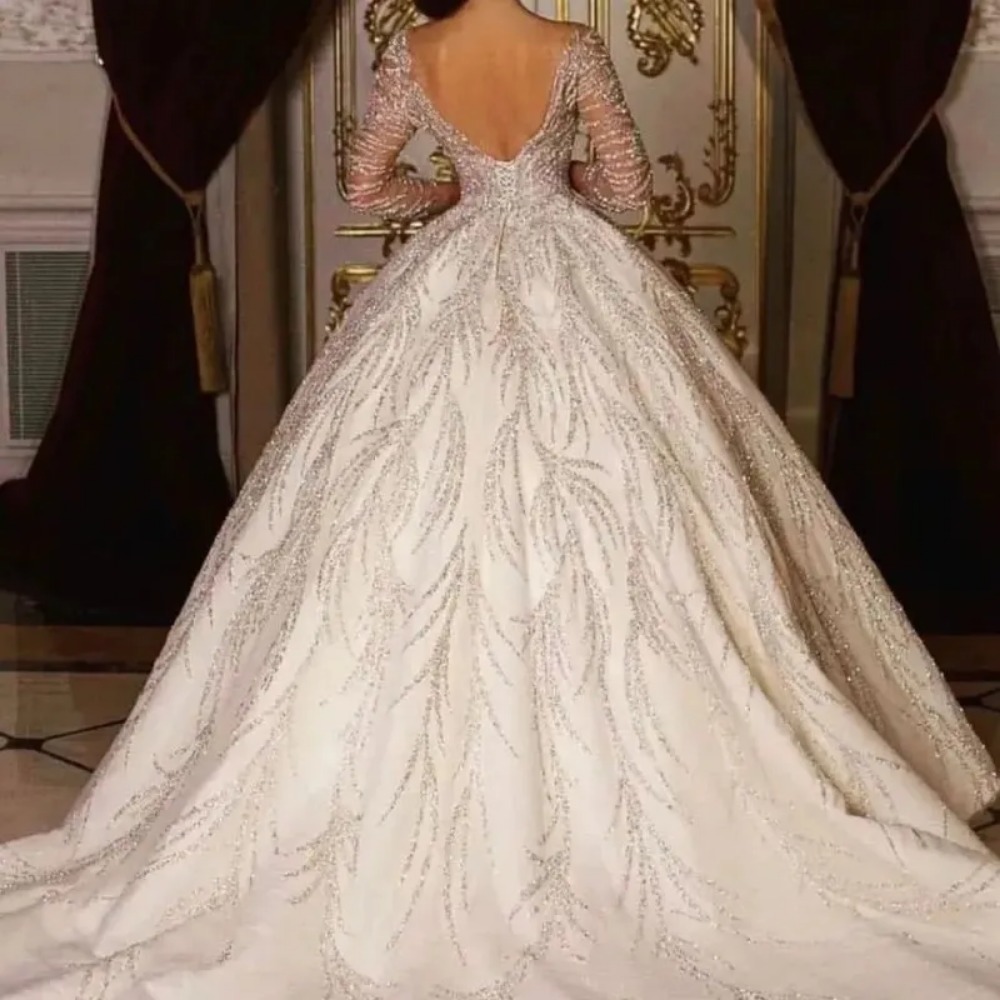 TOUNNINGBRIDE 2024 UTGÅNG DEEP V-HECK BALL GOWN Royal Wedding Dresses Long Sleeve Robe Bling Lace Pärled Princess Glitter Tull Princess Bridal Gown