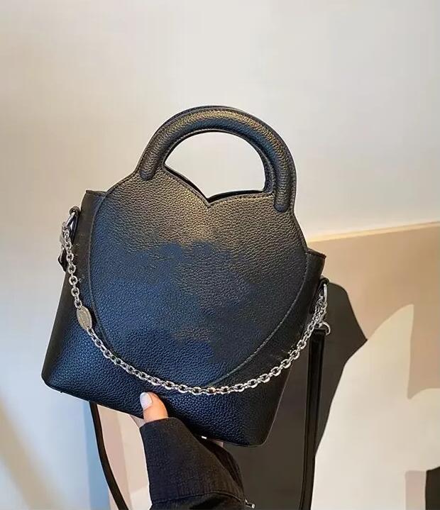 Real cowhide bag bucket bag women one shoulder crossbody bag designer handbag Litchi grain chain decoration tote luxury shopping bags leather bags purses backpack