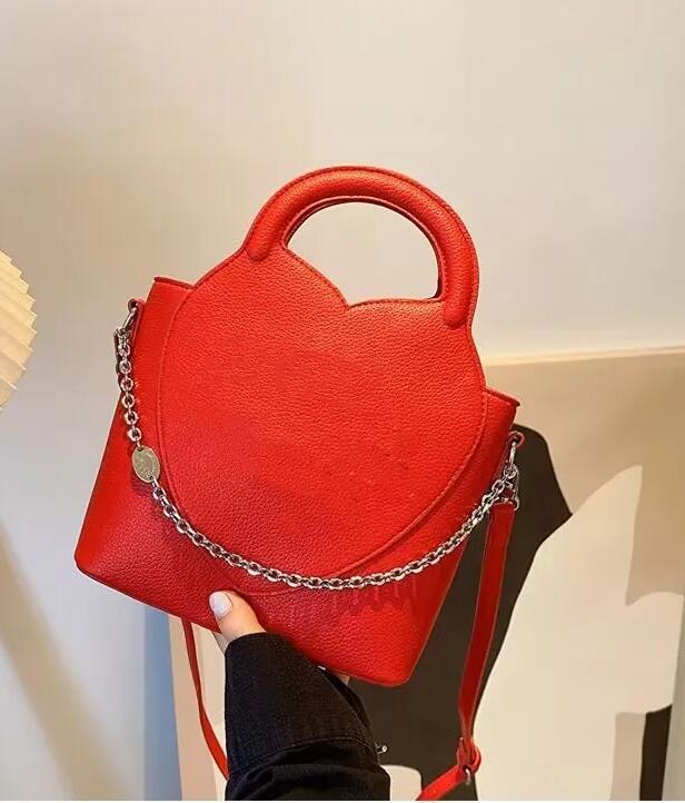 Real cowhide bag bucket bag women one shoulder crossbody bag designer handbag Litchi grain chain decoration tote luxury shopping bags leather bags purses backpack