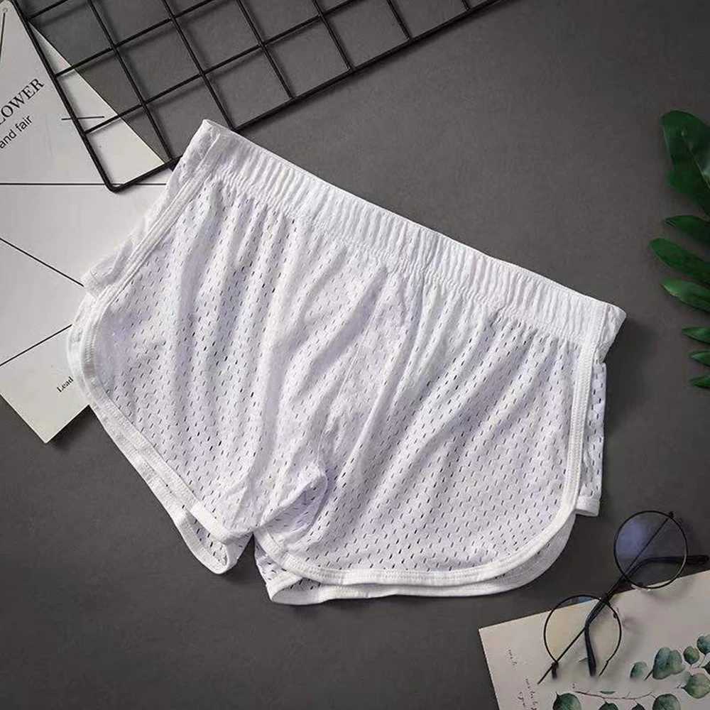 Underbyxor Sexiga män Ice Silk Hollow Boxer Briefs Pouch Underwear Shorts Trunks Underbyxor andningsbara svett absorberar snabbtorkning av pantssl231218