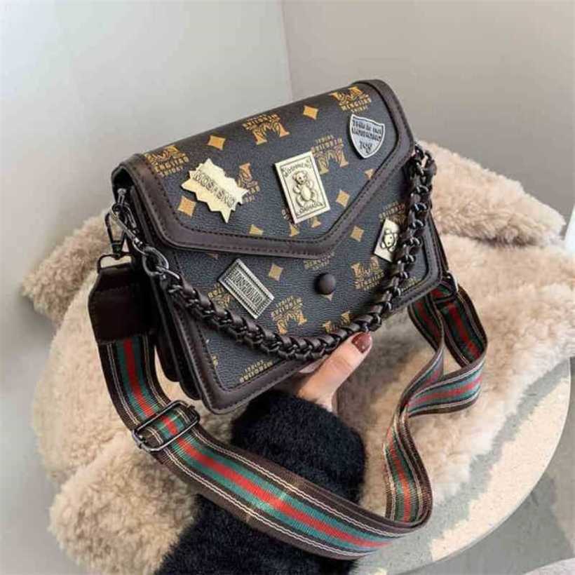 2024 New Designer Womens Crossbody ombro mensageiro coreano letra de cinto largo Trendência