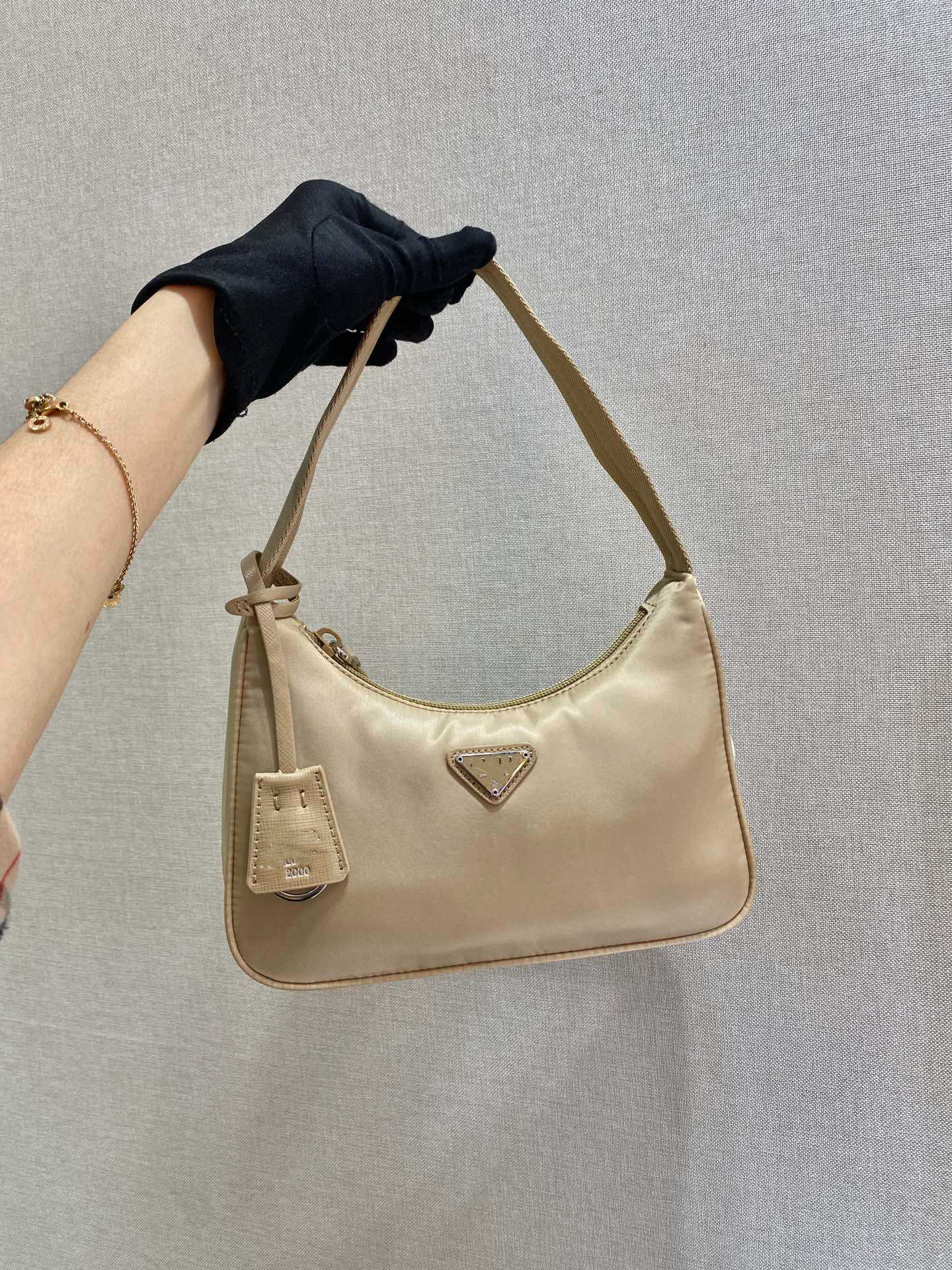 2024 New Designer women's crossbody shoulder Fashion Trend P Home Hobo Nilun Law Stick Underarm Half Crescent One Handheld Genuine Leather Women's Bag bag