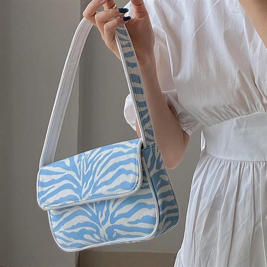 Cross Body Fashion Zebra Match Sac d'épaule féminin Blue Baguette Small Tolevas Girl Messenger Cover Femme Designer Femmes H2369