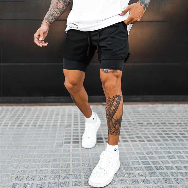 Cuecas 2 em 1 Shorts de corrida Homens 2022 Shorts de ginástica Sport Man 2 em 1 Double-deck Quick Dry Fitness Pants Jogging Pants Sports SweatpantsL231218