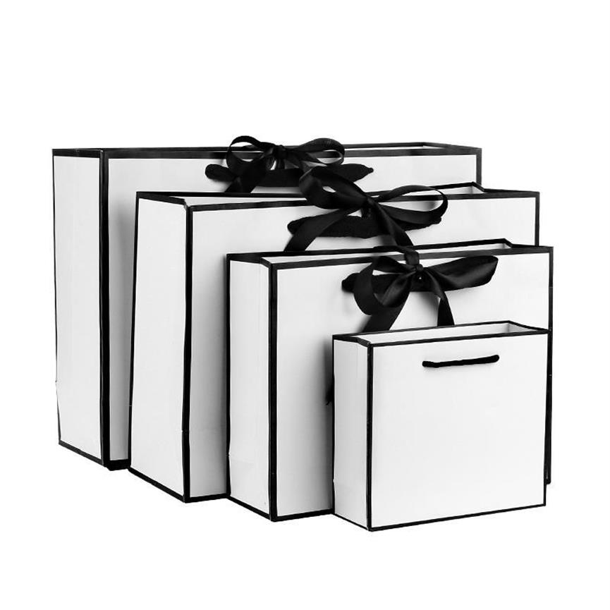 Cadeau cadeau sac en papier kraft blanc avec poignées vêtements shopping grande fête de stockage faveur emballage de bonbons Bow322W