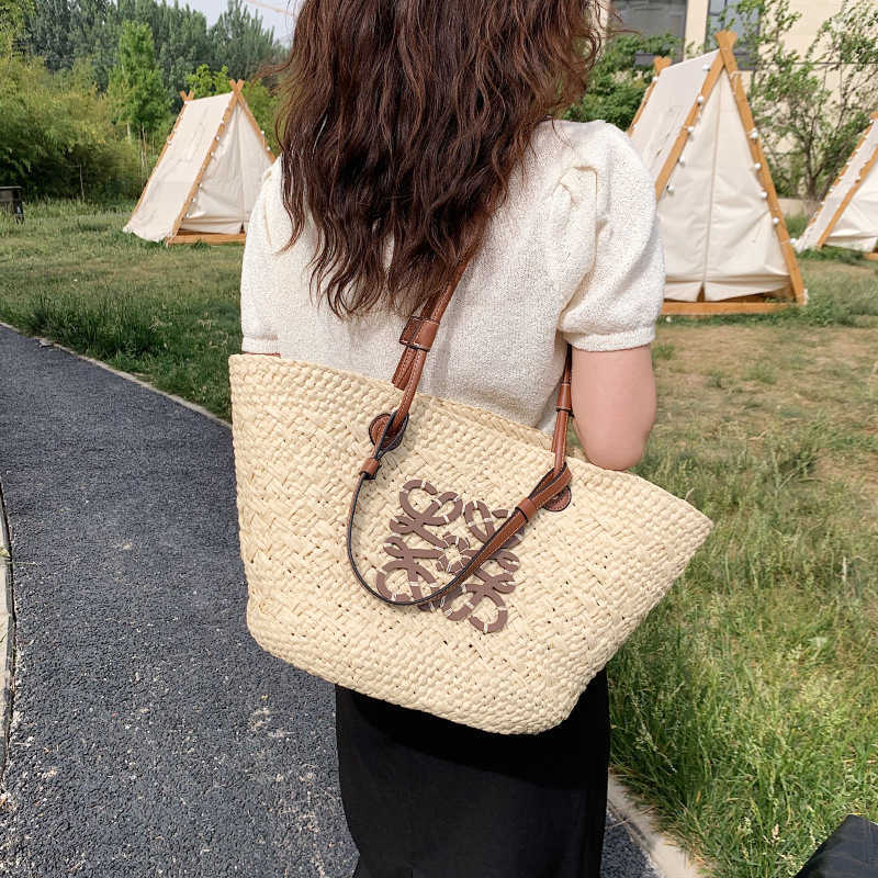 2024 New Designer women's crossbody shoulder Paper Rope Straw Woven for Women's Korean Version Capacity Summer Casual Bag bag