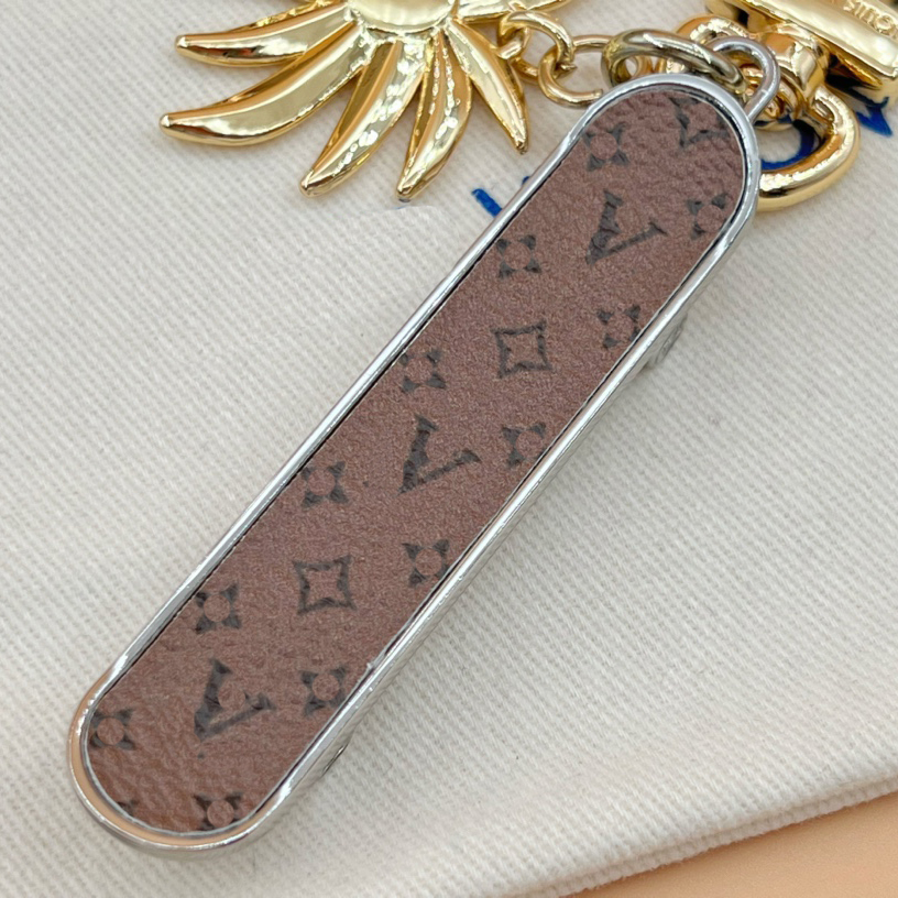 Porte-clés concepteur de couverture porte-clés de luxe de luxe portefeuille portefeuille classique marque de haute qualité voyage essentiel masculin de porte-clés de porte-clés de porte