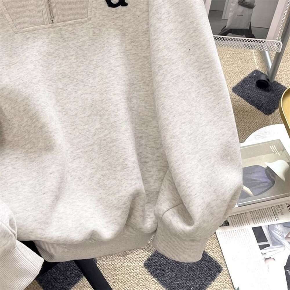 Mantel Trapstar Veet Grey Hoodie Frauen mit halbem Reißverschluss Halsband Eine neue koreanische lose übergroße Jacke für Herbst und Winter 2023