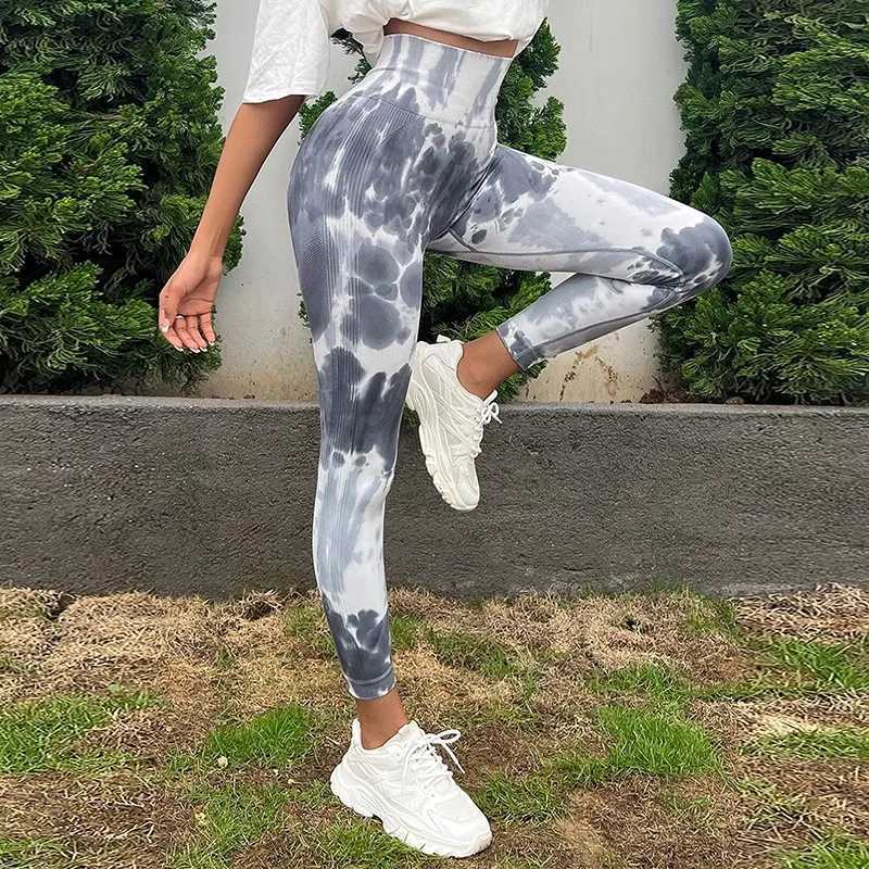 Yoga outfit färgglada casual sportstäder sömlösa slipsfärgade leggings sport leggings kvinnor sexiga leggings hög midja yoga byxor som kör klädsel231221