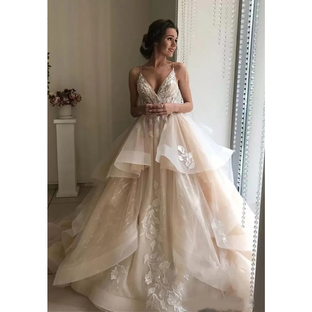 Stunningbride 2024 New Sexy Luxury Champagne A-Line Wedding Dresses Lace Appliques Spaghetti Deep V Neck Ruffles Backless Sweep Train Beach Bridal Gowns