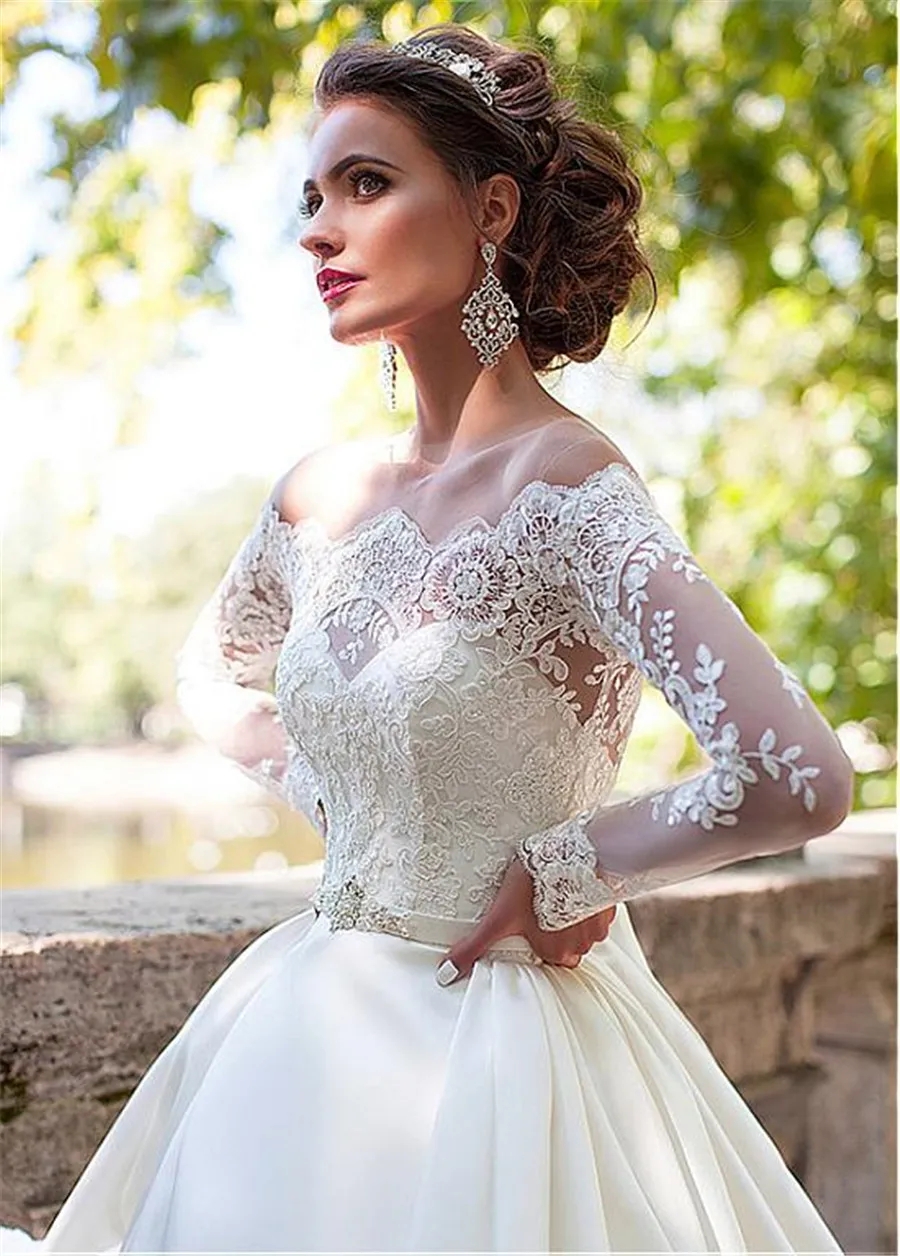 Stunning Tulle Off the Shoulder Sheer Jewel Neckline Ball Gown Wedding Dresses with Belt Long Sleeves Bridal Gown vestido de fiesta