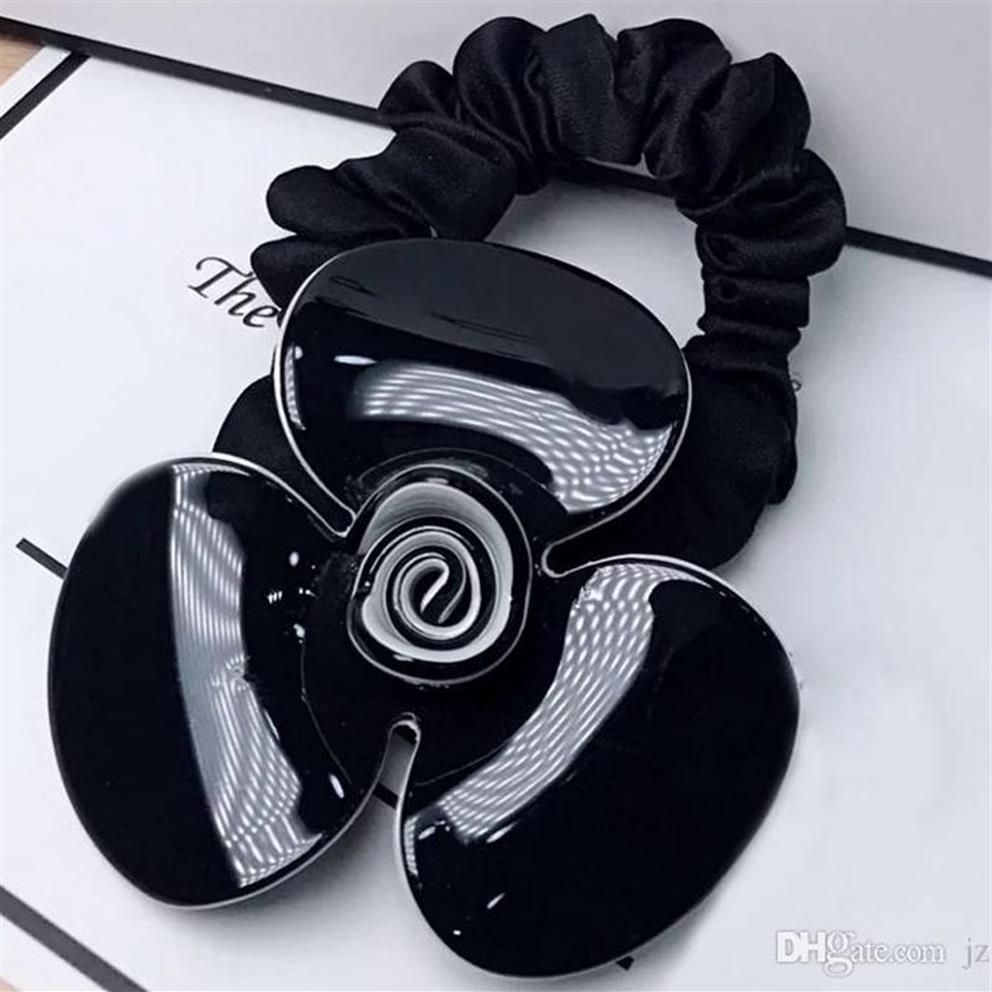 6 5CM black and white Acrylic hair ring Camellia rubber bands head rope for Ladys collection Fashion classic Items Jewelry headdre2819