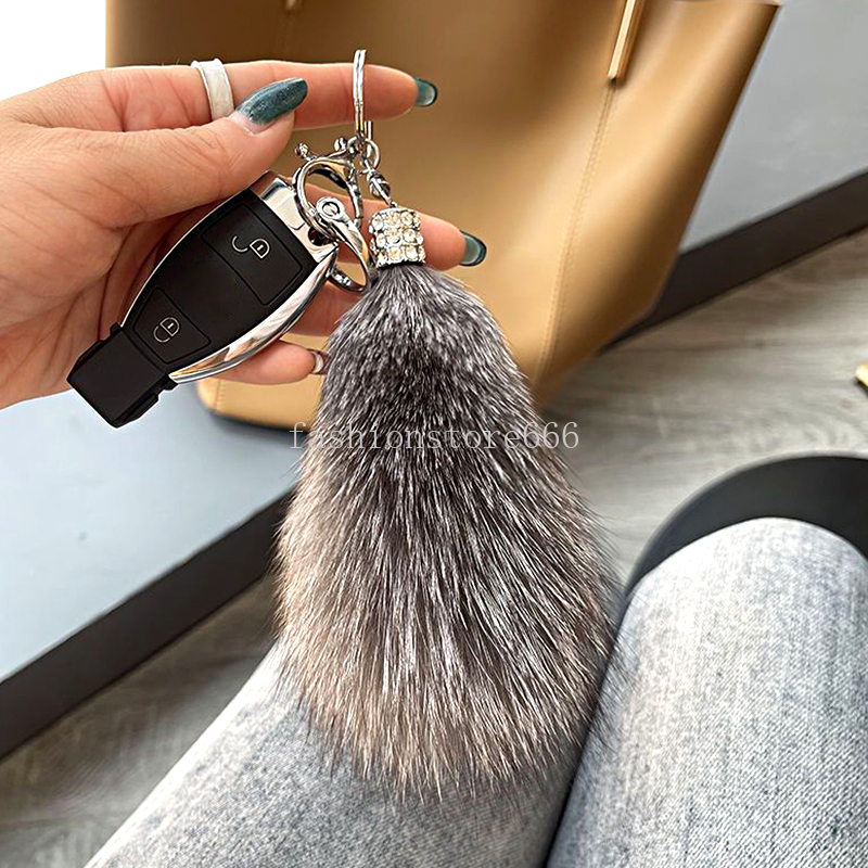 Pendants à queue animale mignon Keeschaines pour femmes hommes pom pom clés de clés anneaux clés de charme