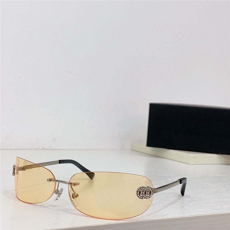 Nouvelles lunettes de soleil enveloppantes de design de mode 71660 Cadre métallique Lobes ovale sans bord