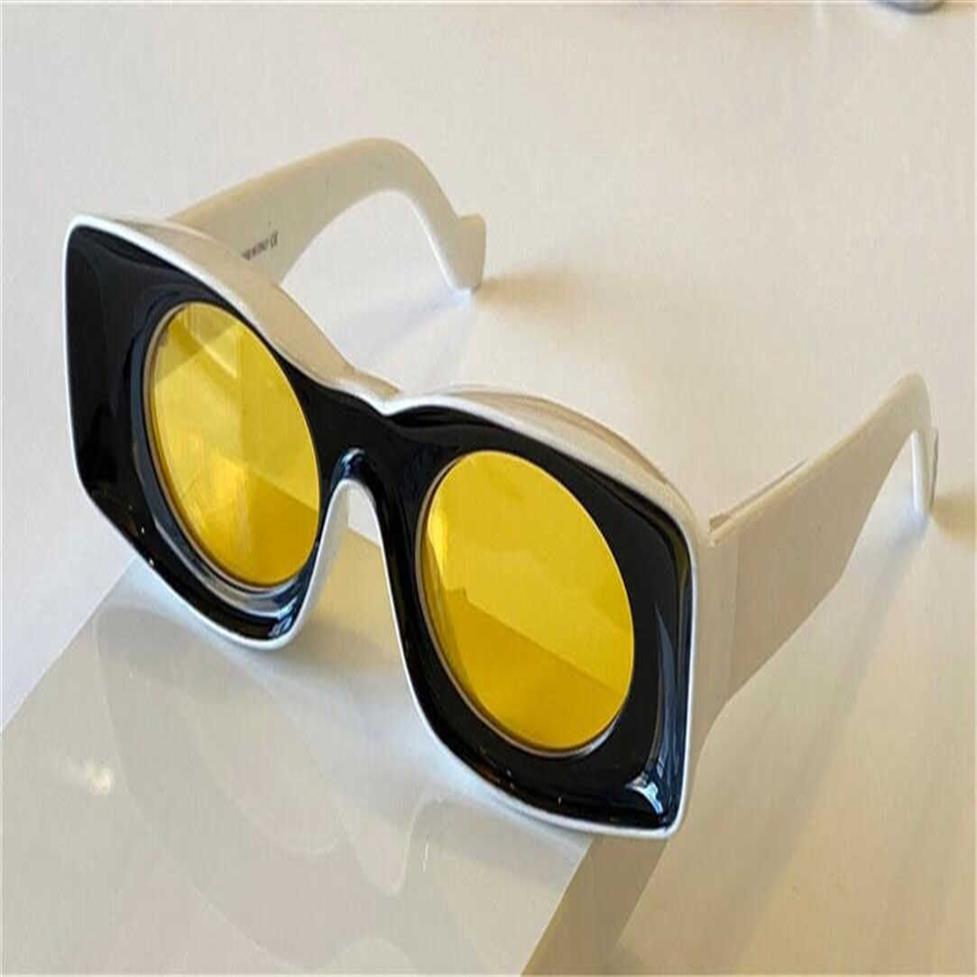 Okulary przeciwsłoneczne Modne okulary przeciwsłoneczne 400331 Specjalny projekt Kolor Square Frame okrągły soczewki Awant-GARDE STYNY CZAKICZNE Z CASE304C