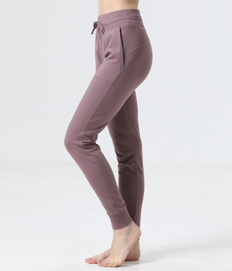 LL Pantalon de jogging pour femme en tissu au toucher nu pour yoga, entraînement, sport, jogging, taille avec cordon de serrage, fitness, course à pied, pantalon de survêtement avec deux poches latérales